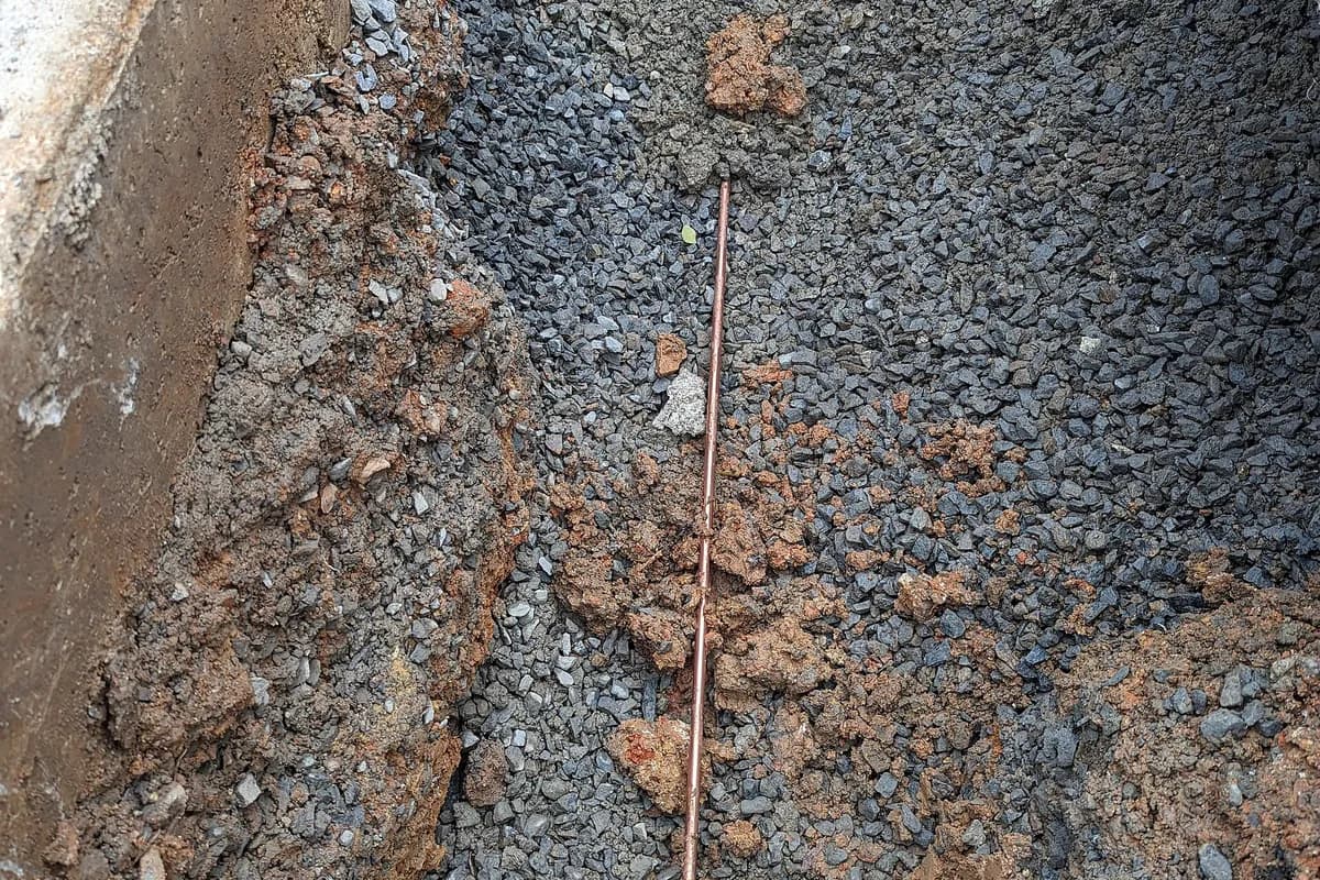 Ground rod being installed in the earth